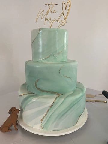 Two-tier mint green agate-marbled wedding cake