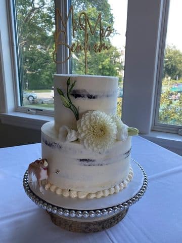 Grey marbled fondant wedding cake with white blooms