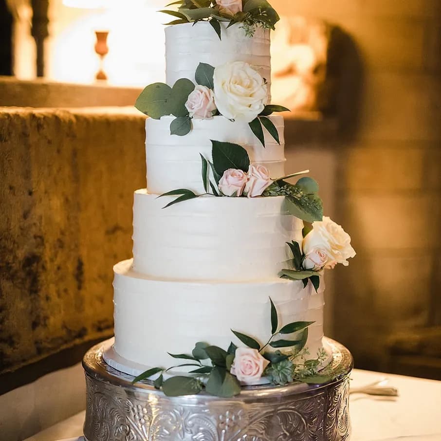A tiered Cake Ann wedding cake finished with delicate handcrafted detail